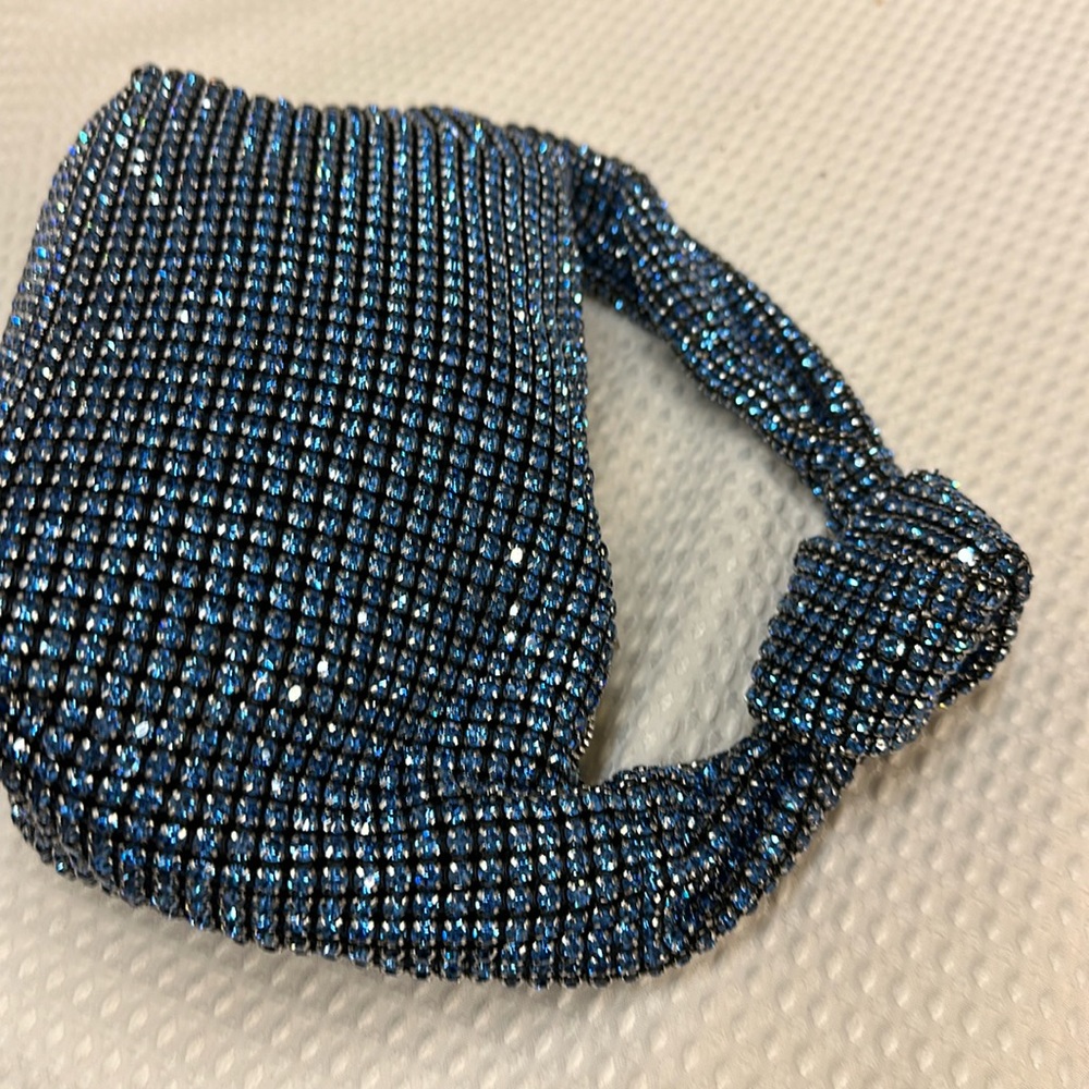 A magnificent dark blue sequined bag with knotted handle. ONE DAY SALE ONLY.